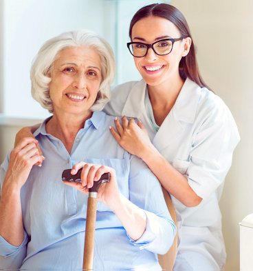 happy caregiver and old woman