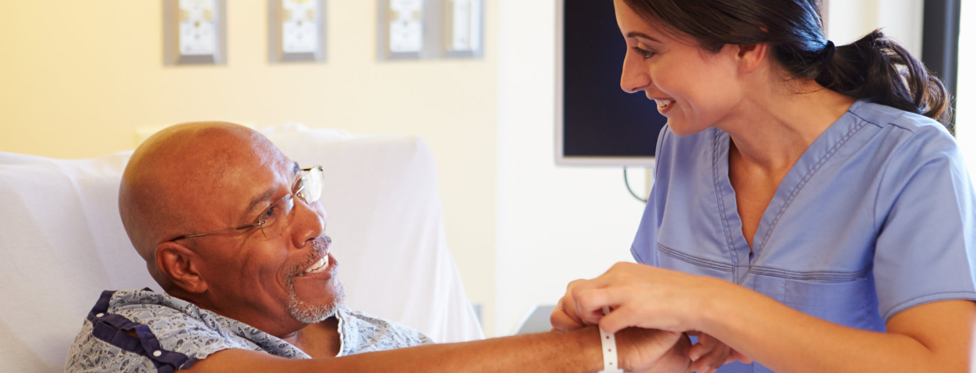 nurse taking care of man