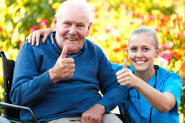 nurse and old man doing thumbs up